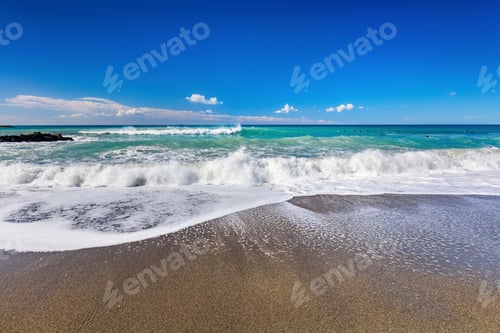Preview: Waves on sandy beach at sunny summer day