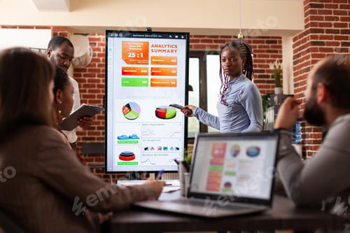 Preview: Businessteam analyzing marketing graph on monitor working at company strategy