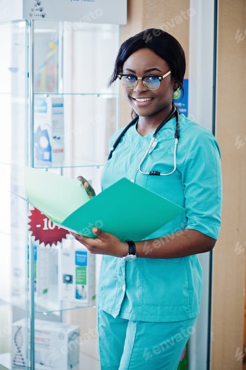 Preview: African american pharmacist working in drugstore
