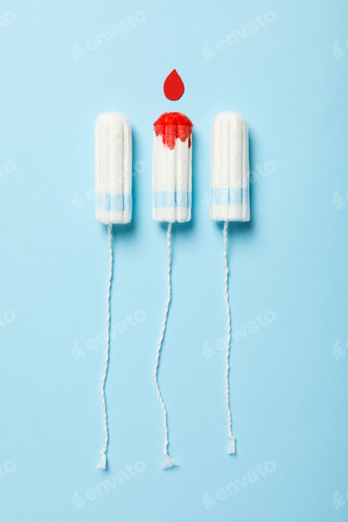 Preview: Tampons for menstrual days on a blue background