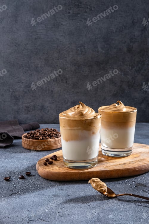 Preview: Dalgona coffee, Iced fluffy creamy whipped trend drink with coffee foam and milk.