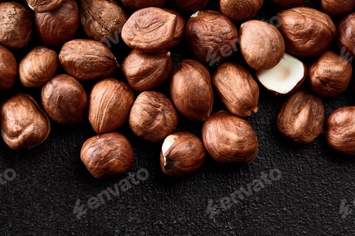 Preview: Close up of Hazelnut kernels - Food Frame Background, macro detailed close up.
