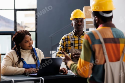 Preview: Storehouse managers planning goods inventory at reception counter
