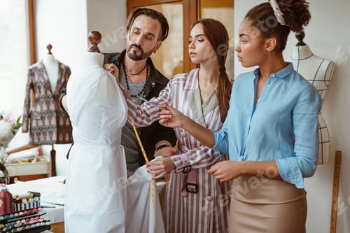 Preview: Fashion Designers Creating a Dress in Studio
