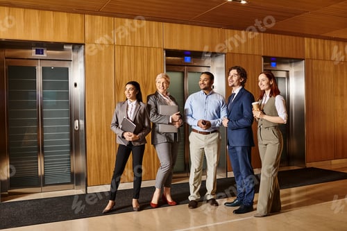 Preview: Elevating Diversity: Business Team Waiting by Elevators