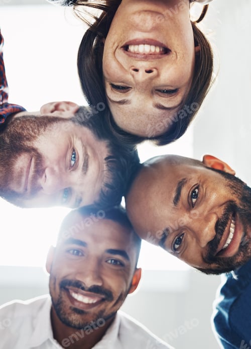Preview: Our circle of success. Portrait of a group of young colleagues huddled together in solidarity.