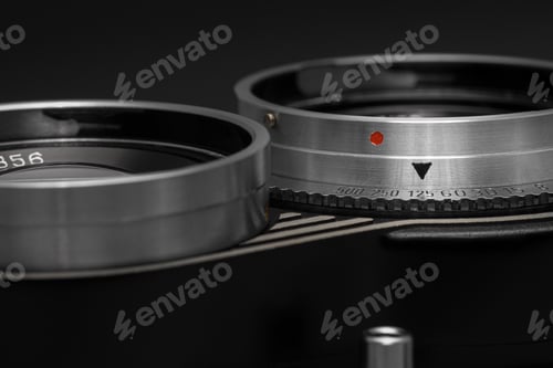 Preview: Lenses and shutter release button of vintage film camera