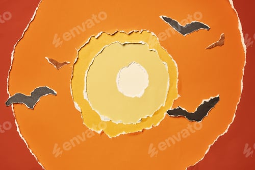 Preview: Layers of colored paper with torn edges. Birds in front of sun. Abstract background in warm colors.