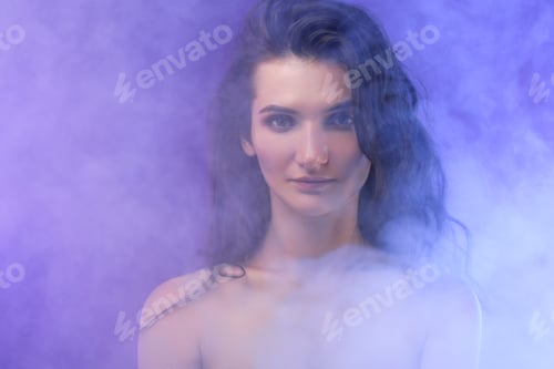 Preview: portrait of nude elegant girl in smoke on purple