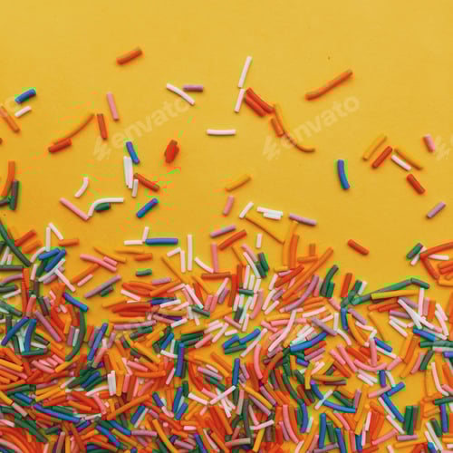 Preview: Colorful Sprinkles on a Yellow Background for Celebration