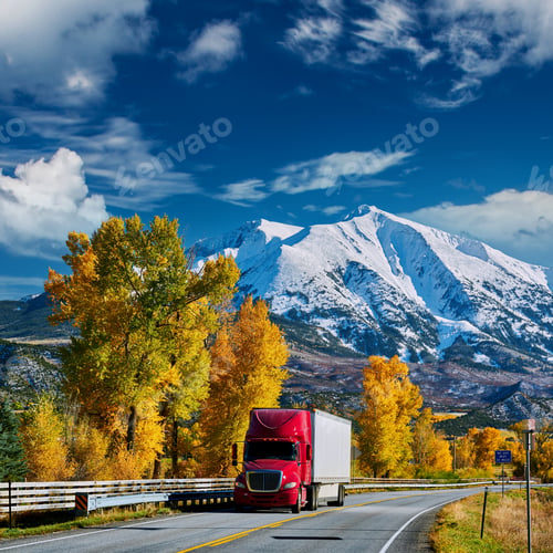 Preview: Red truck on highway in Colorado at autumn