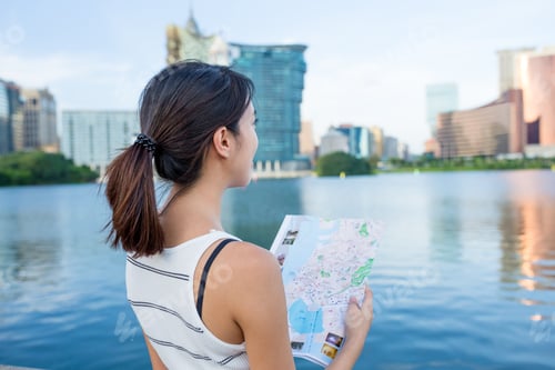Preview: Woman looking for location in Macau