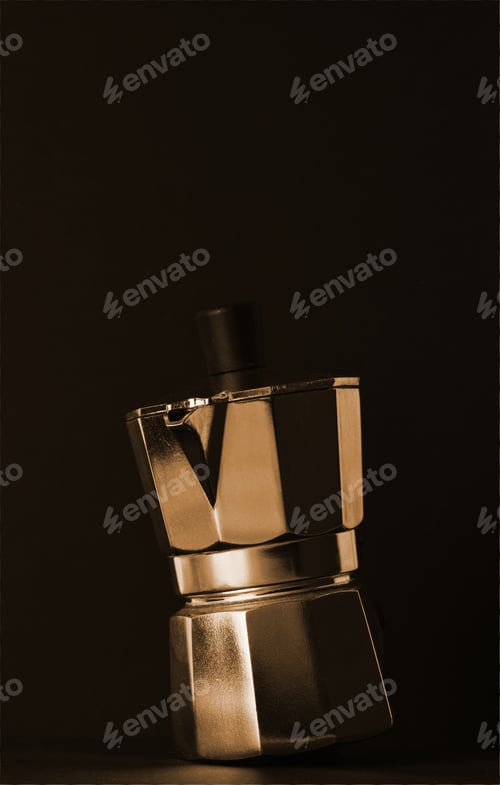 Preview: Aluminum coffee maker isolated on a black background