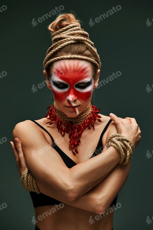 Preview: fashion portrait of pretty young woman with creative make up like a animal, fashion victim. Animal