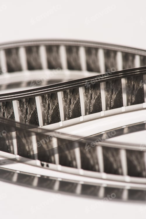 Vista previa: close up view of retro filmstrips on white background