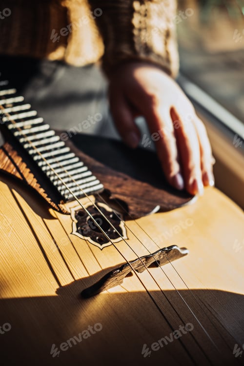 Preview: Domra Folk Musical Instrument. Female hands with 4 strings Natural Wood Handmade Musical Instrument