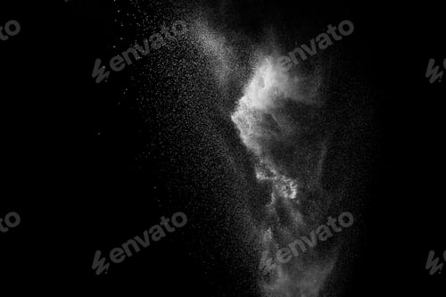 Preview: Freeze motion of white dust particles splash on black background.White powder explosion clouds.