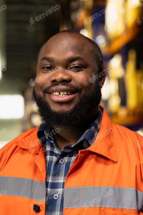 Preview: Portrait of black worker preparing freight shipment in industrial depot