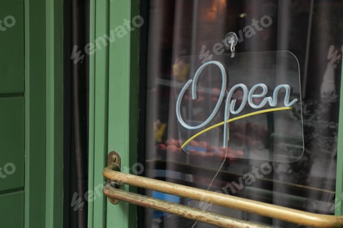 Preview: Sign shows open status at local business during day