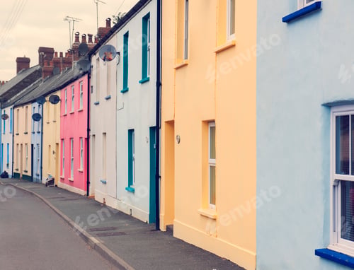 Preview: Colourful houses in street, where Dylan Thomas lived and worked, Laugharne, Carmarthenshire, Wales