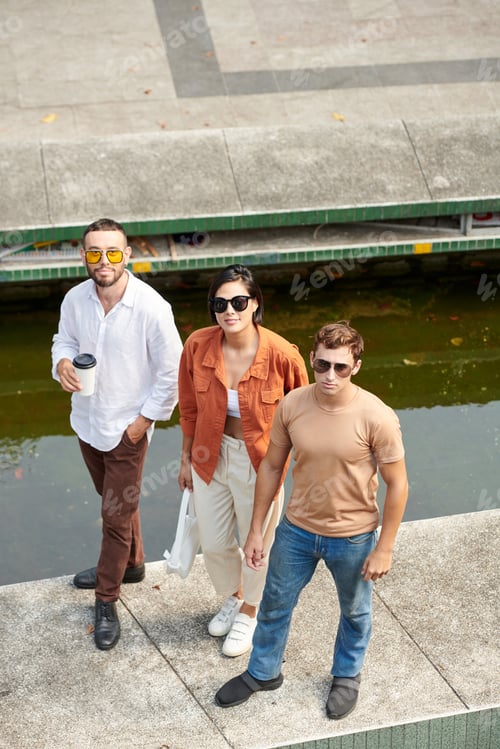 Preview: Group of Friends on River Embarkment