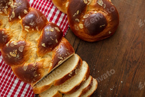 Preview: Easter greek tsoureki braid, sweet bread brioche on wood