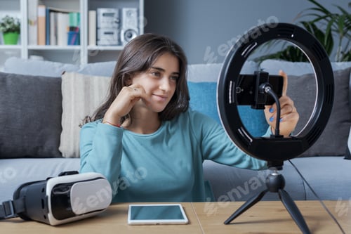 Preview: Girl recording videos for social media at home