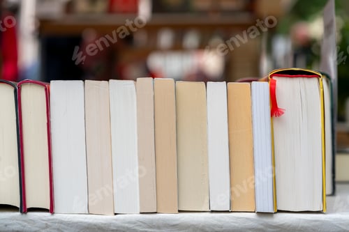Preview: Books in a row on a market stall