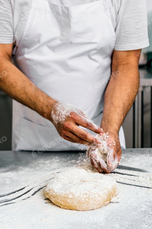 Preview: Artisan Baker Kneading Fresh Dough in Flour, Close-up Shot