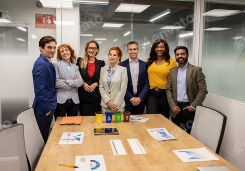 Preview: Multiracial Business Team Posing Together in Conference Room