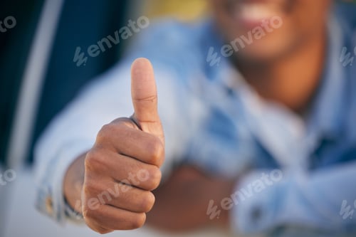Preview: Shot of an unrecognisable man showing thumbs up while traveling in a car