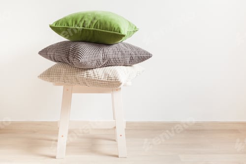 Preview: gray and green cushions cozy home