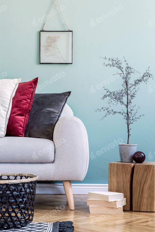 Preview: Stylish composition of cozy living room interior details and colourful classy pillows.