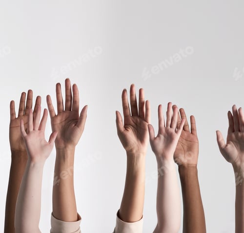 Vista previa: Shot of a diverse group of unidentifiable people holding their hands up against a white background