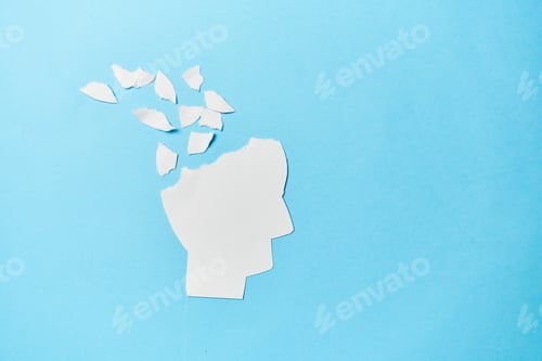 Preview: Concept of memory loss and dementia disease and alzheimer. Fading head silhouette