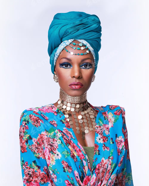 Preview: Portrait of a beautiful African-American female with a headwrap isolated on white background