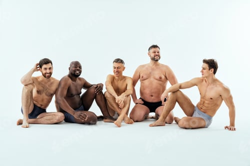 Preview: Group of multiethnic men posing for a male edition body positive beauty set