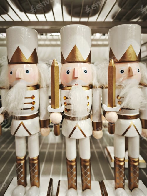 Preview: Tall white nutcracker soldiers with gold accents in shop