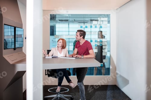 Preview: Business people discussing in office