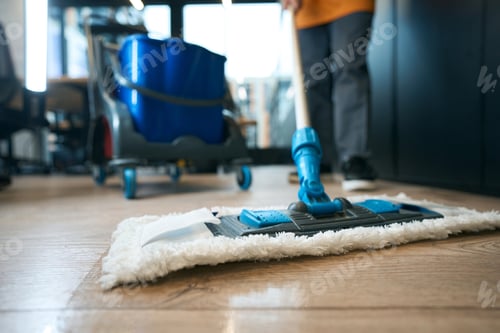 Preview: Cleaning services in coworking area, workers use mop, buckets, special cart