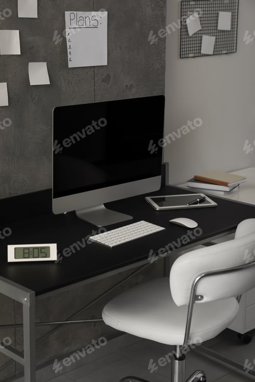 Preview: Stylish room interior with comfortable workplace near grey wall