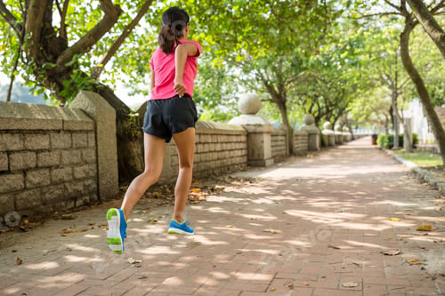 Preview: Woman running in a park