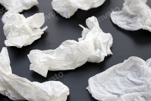 Preview: Crumpled tissue paper. Facial tissue on dark background.