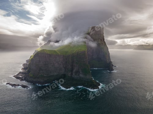 Preview: Kallur lighthouse on green hills of Kalsoy island, Faroe islands, Denmark
