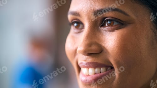 Preview: Close Up Portrait Of Smiling Female Doctor Or Nurse Wearing Scrubs And Stethoscope In Hospital