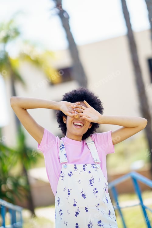 Preview: Woman covering eyes on street