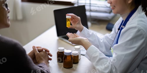 Preview: Young woman doctor sit work desk with senior old man patient prescribe drugs or pills, female nurse