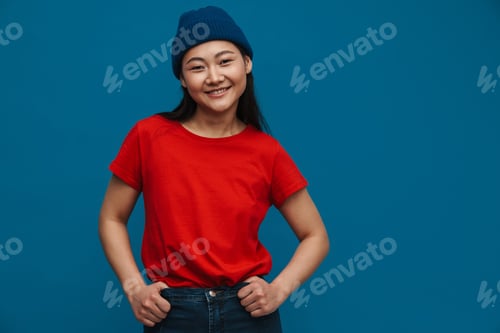 Preview: Portrait of a casual young asian woman standing