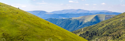 Preview: Panorama of green hills in summer mountains