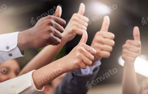 Preview: Were at the top of our game. Shot of a group of business people giving the thumbs up.